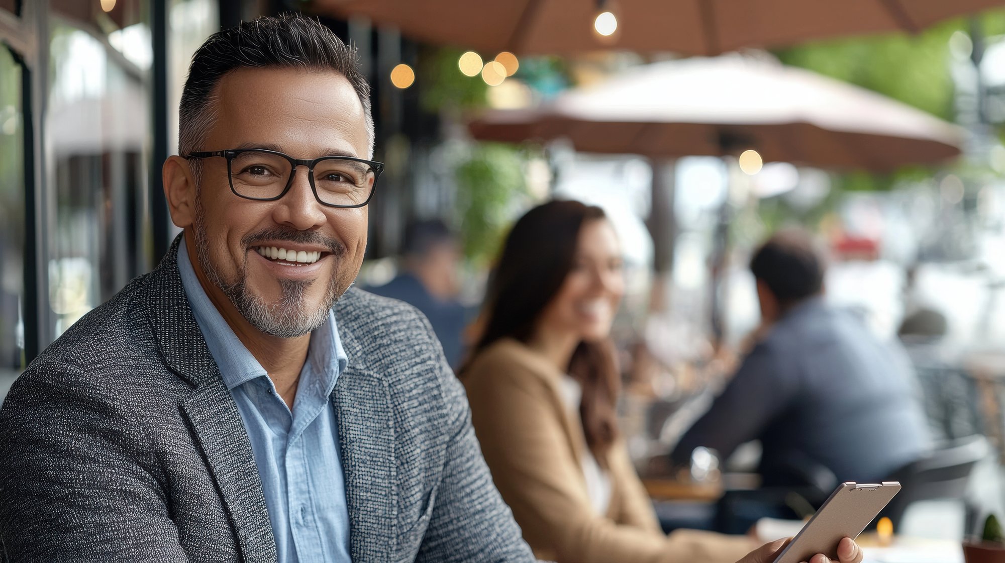 Insurance Agent sitting at a local cafe in town.