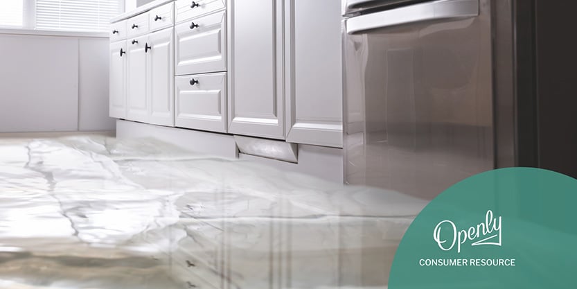 Water floods a kitchen floor. 