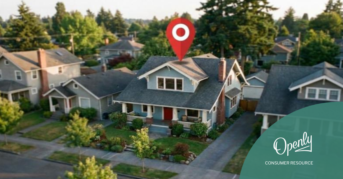 An overhead view of a residential neighborhood with a map pin over a two story house. 